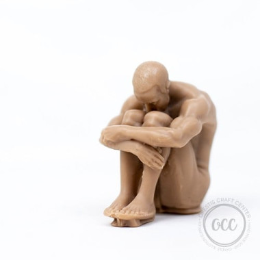 Naked male body statuette